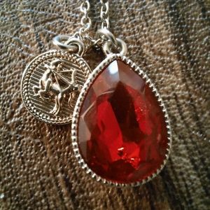 NWT (Avon) double pendant red crystal and charm teardop necklace.